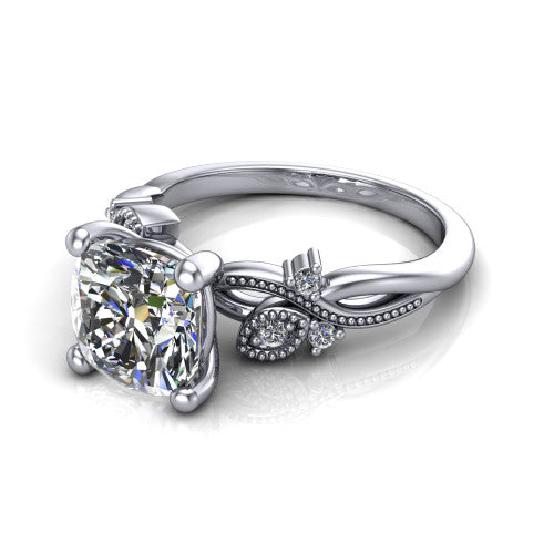 Ashley cushion solitaire engagement ring in 18K White Gold, three-quarter perspective showing the cushion center diamond above a milgrain leaf-and-vine band