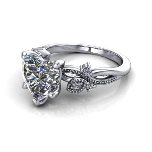 Ashley heart solitaire engagement ring in Platinum, three-quarter perspective showing the heart center diamond above a milgrain leaf-and-vine band