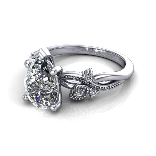 Ashley pear solitaire engagement ring in 14K White Gold, three-quarter perspective showing the pear center diamond above a milgrain leaf-and-vine band