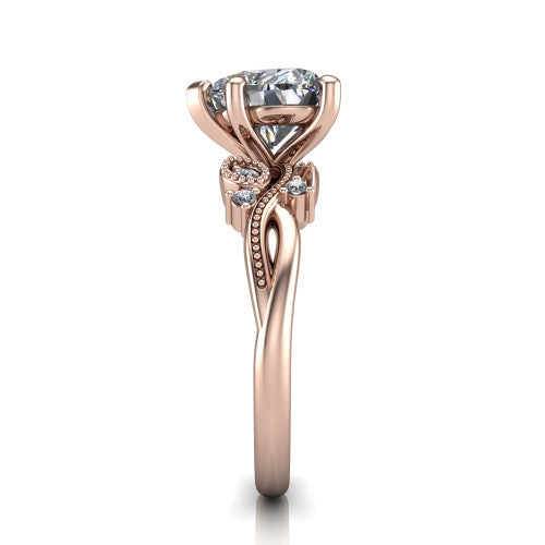 Ashley heart solitaire engagement ring in 14K Rose Gold, side profile showing the leaf motif, diamond accents, and twisted band in side view