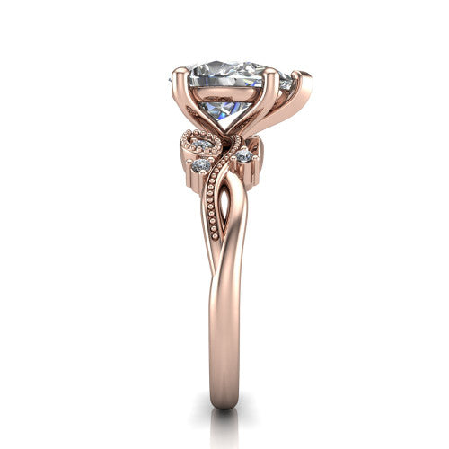 Ashley pear solitaire engagement ring in 18K Rose Gold, side profile showing the leaf motif, diamond accents, and twisted band in side view