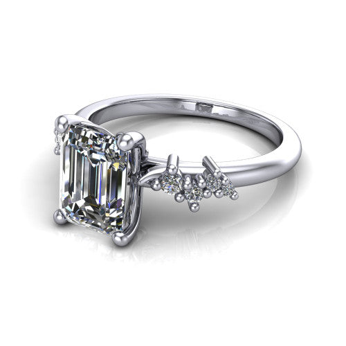 Georgia emerald-cut classic engagement ring in 14K White Gold, three-quarter perspective showing the emerald-cut center diamond and scattered cluster accents on the band