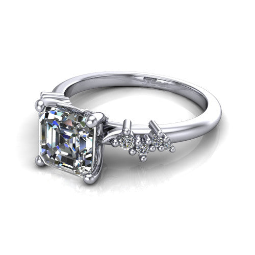 Georgia square emerald-cut classic engagement ring in Platinum, three-quarter perspective showing the square emerald-cut center diamond and scattered cluster accents on the band