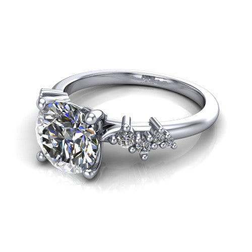 Georgia round classic engagement ring in Platinum, three-quarter perspective showing the round center diamond and scattered cluster accents on the band