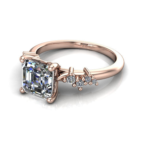 Georgia square emerald-cut classic engagement ring in 18K Rose Gold, three-quarter perspective showing the square emerald-cut center diamond and scattered cluster accents on the band