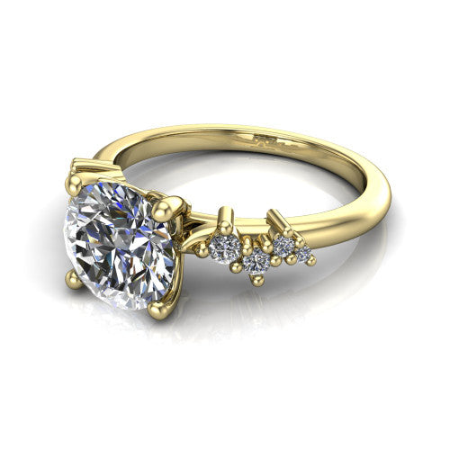Georgia round classic engagement ring in 14K Yellow Gold, three-quarter perspective showing the round center diamond and scattered cluster accents on the band