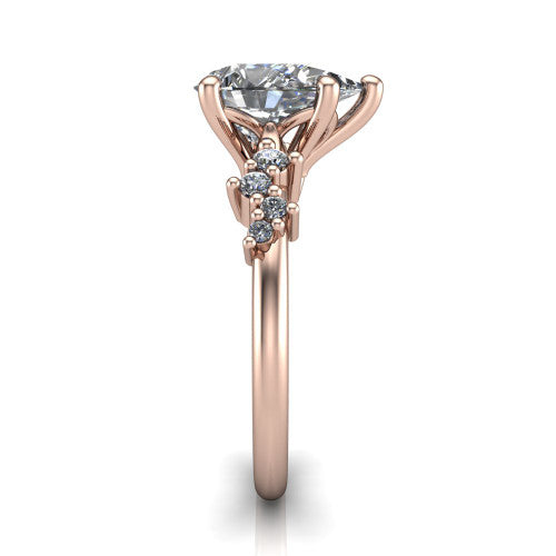 Georgia pear classic engagement ring in 14K Rose Gold, side profile showing the cluster accents, basket gallery, and slim band in side view