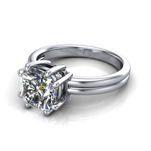Lainey cushion solitaire engagement ring in 18K White Gold, three-quarter perspective showing the cushion center diamond raised in a double-claw prong head on a polished band