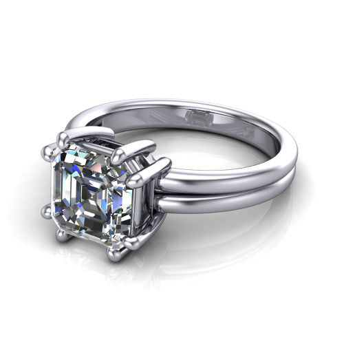 Lainey square emerald-cut solitaire engagement ring in 18K White Gold, three-quarter perspective showing the square emerald-cut center diamond raised in a double-claw prong head on a polished band