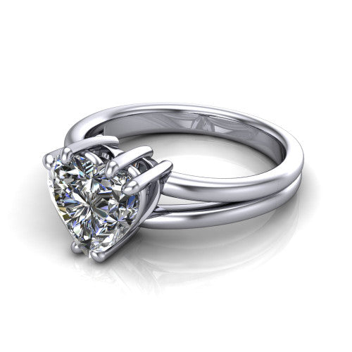 Lainey heart solitaire engagement ring in Platinum, three-quarter perspective showing the heart center diamond raised in a double-claw prong head on a polished band