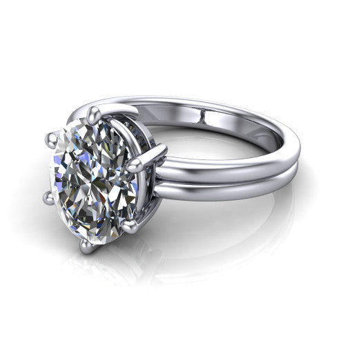 Lainey oval solitaire engagement ring in 14K White Gold, three-quarter perspective showing the oval center diamond raised in a double-claw prong head on a polished band