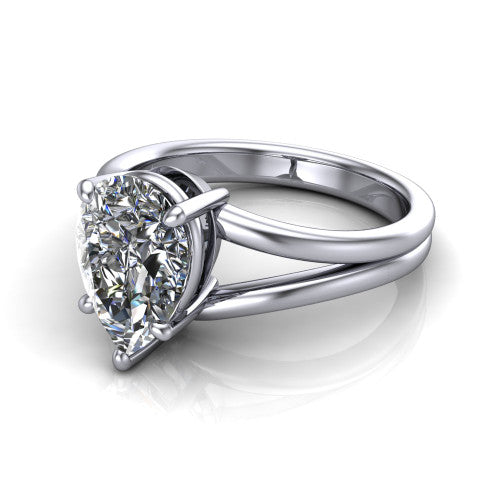 Lainey pear solitaire engagement ring in 18K White Gold, three-quarter perspective showing the pear center diamond raised in a double-claw prong head on a polished band