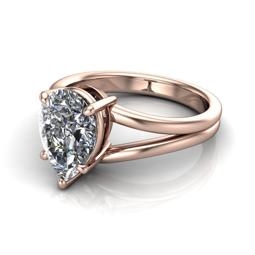 Lainey pear solitaire engagement ring in 14K Rose Gold, three-quarter perspective showing the pear center diamond raised in a double-claw prong head on a polished band