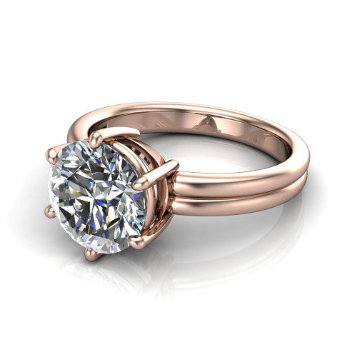 Lainey round solitaire engagement ring in 14K Rose Gold, three-quarter perspective showing the round center diamond raised in a double-claw prong head on a polished band