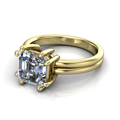Lainey square emerald-cut solitaire engagement ring in 14K Yellow Gold, three-quarter perspective showing the square emerald-cut center diamond raised in a double-claw prong head on a polished band