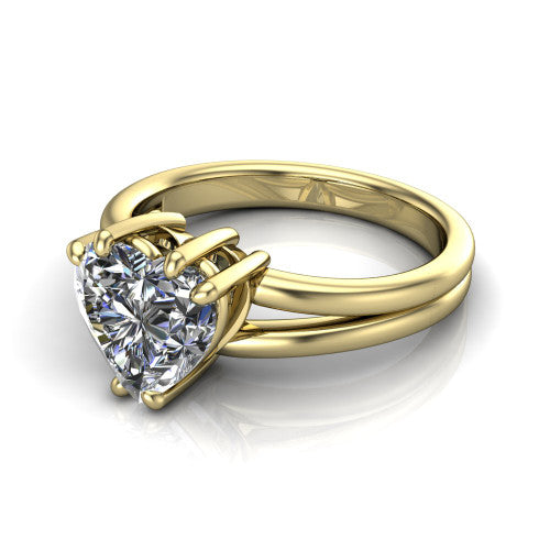 Lainey heart solitaire engagement ring in 14K Yellow Gold, three-quarter perspective showing the heart center diamond raised in a double-claw prong head on a polished band