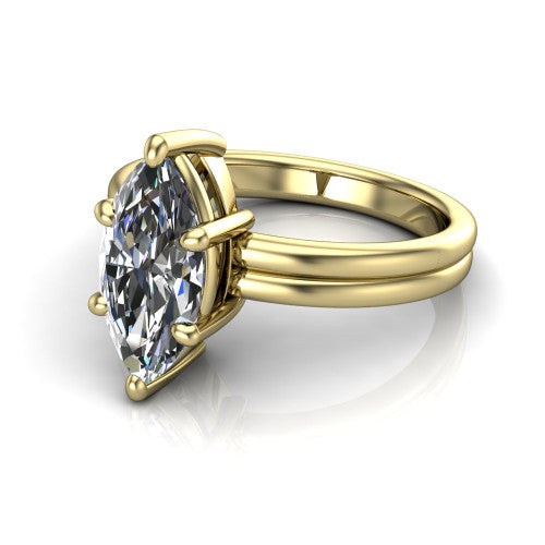 Lainey marquise solitaire engagement ring in 14K Yellow Gold, three-quarter perspective showing the marquise center diamond raised in a double-claw prong head on a polished band