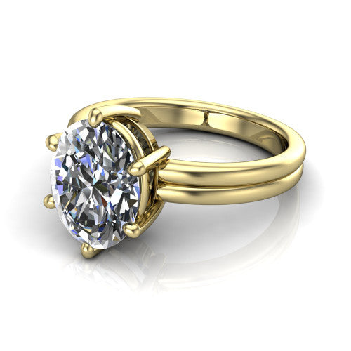 Lainey oval solitaire engagement ring in 14K Yellow Gold, three-quarter perspective showing the oval center diamond raised in a double-claw prong head on a polished band