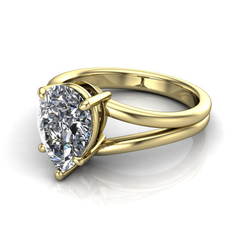 Lainey pear solitaire engagement ring in 18K Yellow Gold, three-quarter perspective showing the pear center diamond raised in a double-claw prong head on a polished band