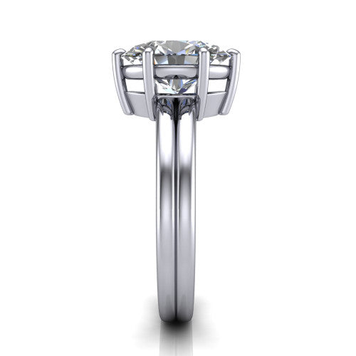 Lainey oval solitaire engagement ring in Platinum, side profile showing the prong head, polished tapered band, and comfort-fit profile