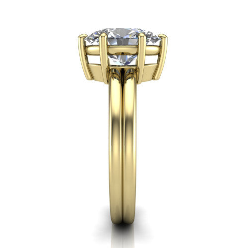 Lainey oval solitaire engagement ring in 14K Yellow Gold, side profile showing the prong head, polished tapered band, and comfort-fit profile
