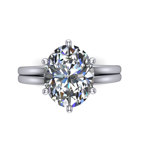 Lainey oval solitaire engagement ring in Platinum, top-down view showing the oval center diamond from above in its double-claw head