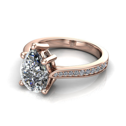 Myla pear classic engagement ring in 18K Rose Gold, three-quarter perspective showing the pear center diamond in a four-prong cathedral head above a pave band