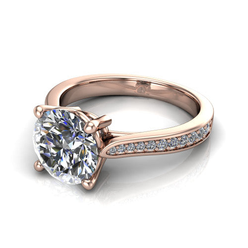 Myla round solitaire engagement ring in 14K Rose Gold, three-quarter perspective showing the round center diamond in a four-prong cathedral head above a pave band