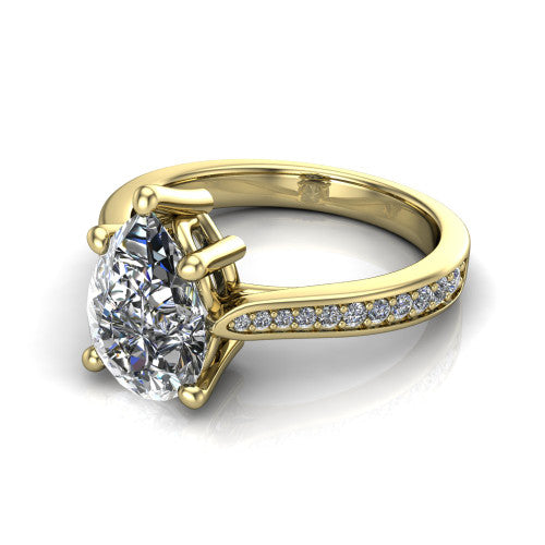 Myla pear classic engagement ring in 18K Yellow Gold, three-quarter perspective showing the pear center diamond in a four-prong cathedral head above a pave band