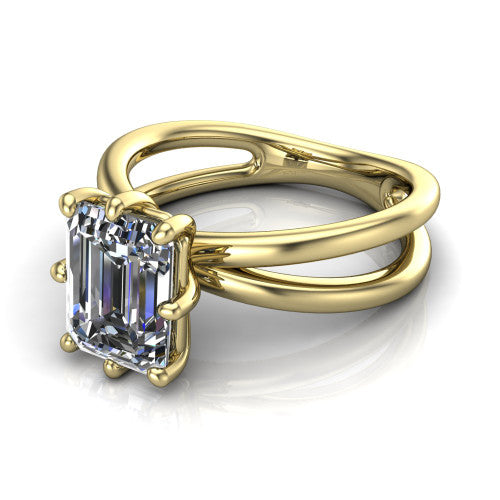 Rain emerald-cut classic engagement ring in 14K Yellow Gold, three-quarter perspective showing the emerald-cut center diamond in a double-claw head above a split polished band