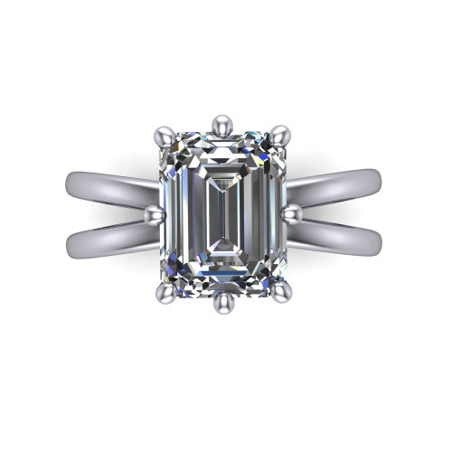 Rain emerald-cut classic engagement ring in Platinum, top-down view showing the emerald-cut center diamond and paired prongs from above