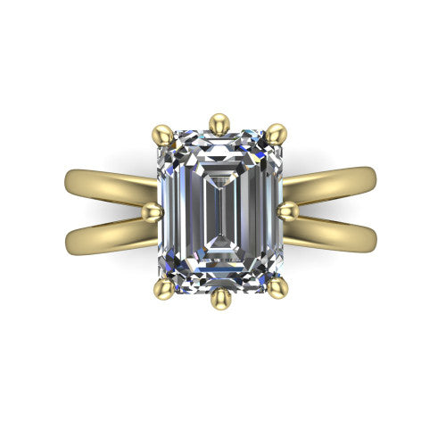 Rain emerald-cut classic engagement ring in 14K Yellow Gold, top-down view showing the emerald-cut center diamond and paired prongs from above