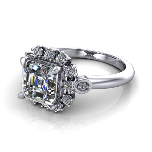June square emerald-cut halo engagement ring in 14K White Gold, three-quarter perspective showing the square emerald-cut center diamond in an ornate cluster halo with bezel side accents