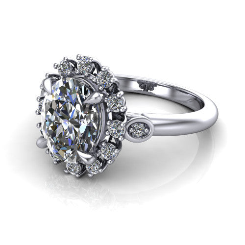 June oval halo engagement ring in 14K White Gold, three-quarter perspective showing the oval center diamond in an ornate cluster halo with bezel side accents