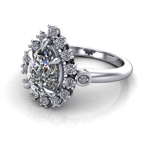 June pear halo engagement ring in Platinum, three-quarter perspective showing the pear center diamond in an ornate cluster halo with bezel side accents