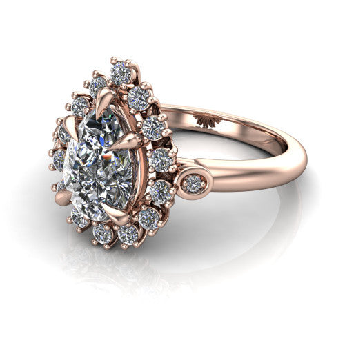 June pear halo engagement ring in 14K Rose Gold, three-quarter perspective showing the pear center diamond in an ornate cluster halo with bezel side accents