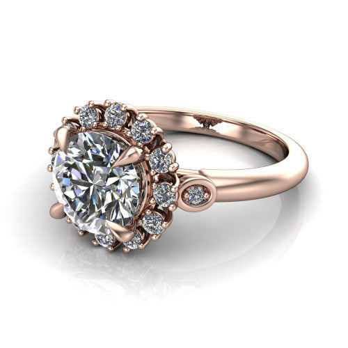 June round halo engagement ring in 14K Rose Gold, three-quarter perspective showing the round center diamond in an ornate cluster halo with bezel side accents