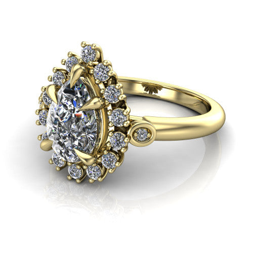 June pear halo engagement ring in 14K Yellow Gold, three-quarter perspective showing the pear center diamond in an ornate cluster halo with bezel side accents