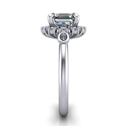 June square emerald-cut halo engagement ring in Platinum, side profile showing the cluster halo, bezel accents, and slim band in side view