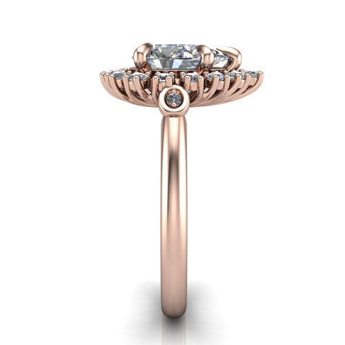 June pear halo engagement ring in 14K Rose Gold, side profile showing the cluster halo, bezel accents, and slim band in side view