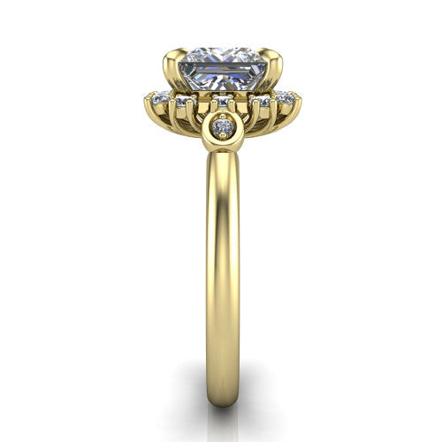 June princess-cut halo engagement ring in 18K Yellow Gold, side profile showing the cluster halo, bezel accents, and slim band in side view