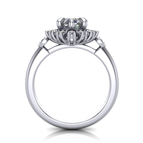June heart halo engagement ring in Platinum, through-finger front profile showing the cluster halo and bezel accents from the front