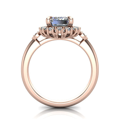 June emerald-cut halo engagement ring in 14K Rose Gold, through-finger front profile showing the cluster halo and bezel accents from the front