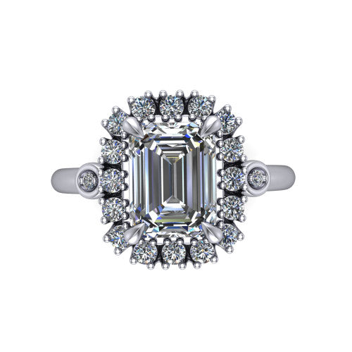 June emerald-cut halo engagement ring in Platinum, top-down view showing the emerald-cut center diamond framed by the cluster halo from above