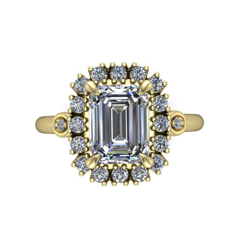 June emerald-cut halo engagement ring in 18K Yellow Gold, top-down view showing the emerald-cut center diamond framed by the cluster halo from above