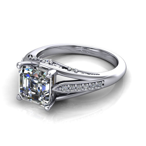 Blakely square emerald-cut solitaire engagement ring in 18K White Gold, three-quarter perspective showing the square emerald-cut center diamond above a split-shank pave band with filigree gallery