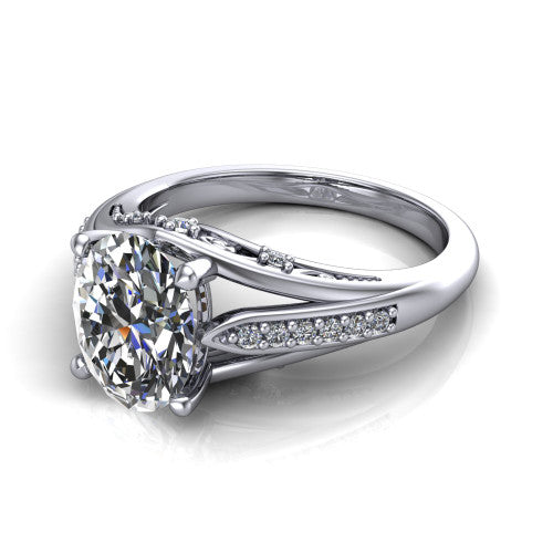 Blakely oval solitaire engagement ring in 14K White Gold, three-quarter perspective showing the oval center diamond above a split-shank pave band with filigree gallery