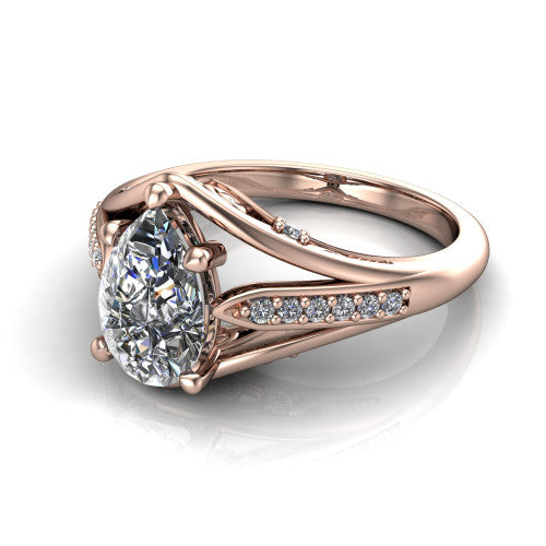 Blakely pear solitaire engagement ring in 14K Rose Gold, three-quarter perspective showing the pear center diamond above a split-shank pave band with filigree gallery
