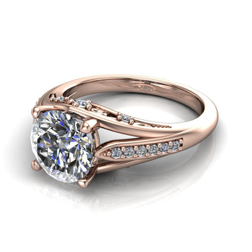 Blakely round solitaire engagement ring in 14K Rose Gold, three-quarter perspective showing the round center diamond above a split-shank pave band with filigree gallery