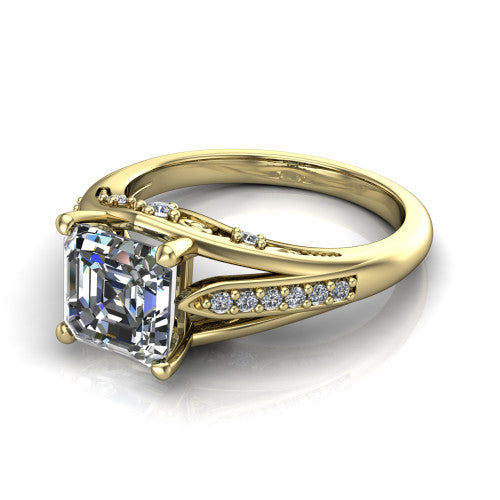 Blakely square emerald-cut solitaire engagement ring in 14K Yellow Gold, three-quarter perspective showing the square emerald-cut center diamond above a split-shank pave band with filigree gallery